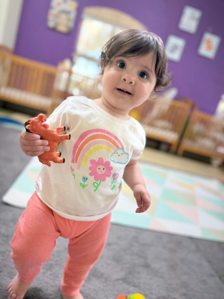 Educator working with children at Creative Minds Montessori